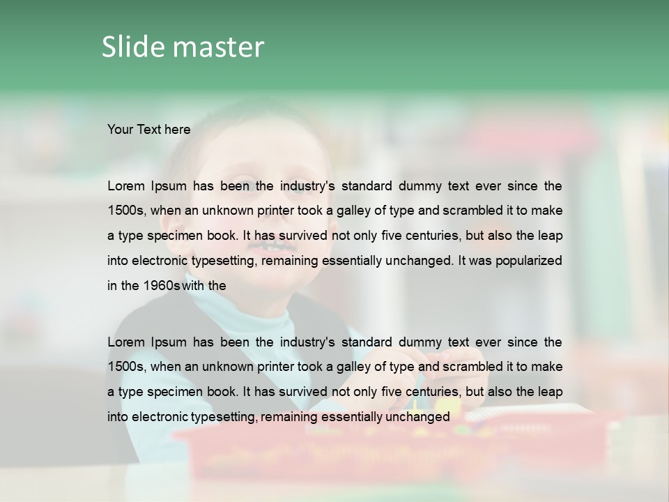 A Young Boy Is Sitting At A Table PowerPoint Template