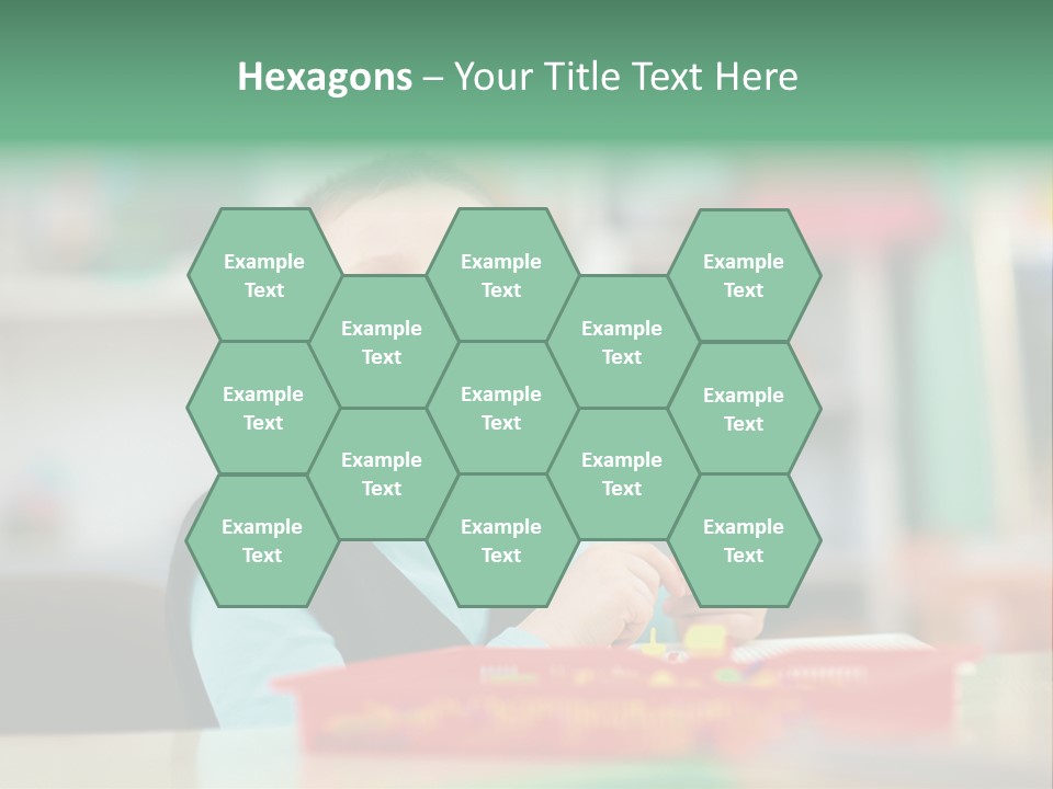 A Young Boy Is Sitting At A Table PowerPoint Template