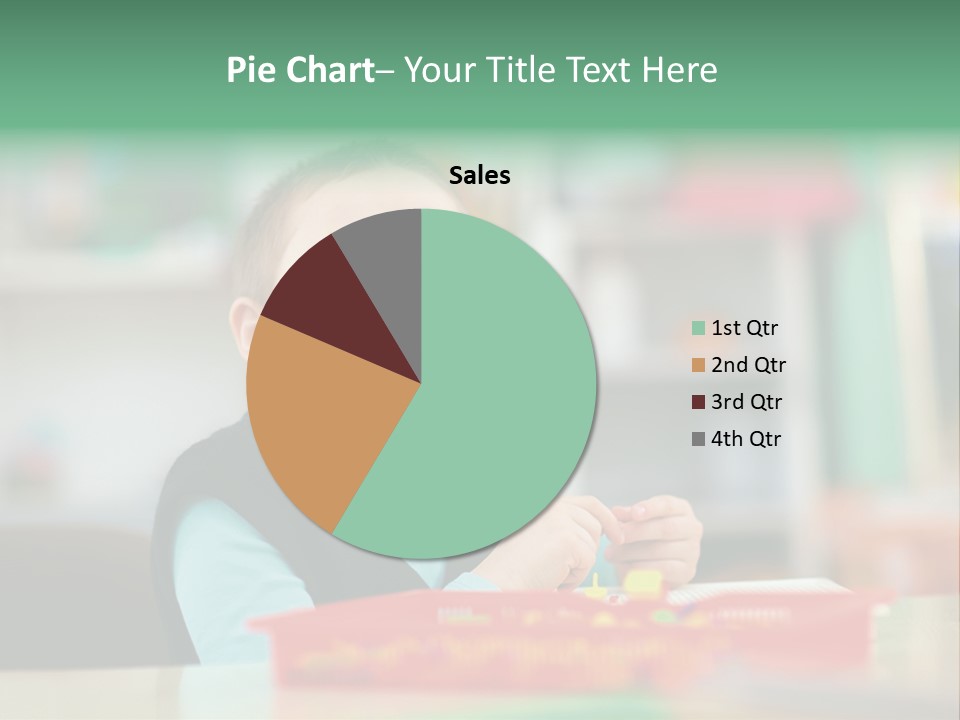 A Young Boy Is Sitting At A Table PowerPoint Template