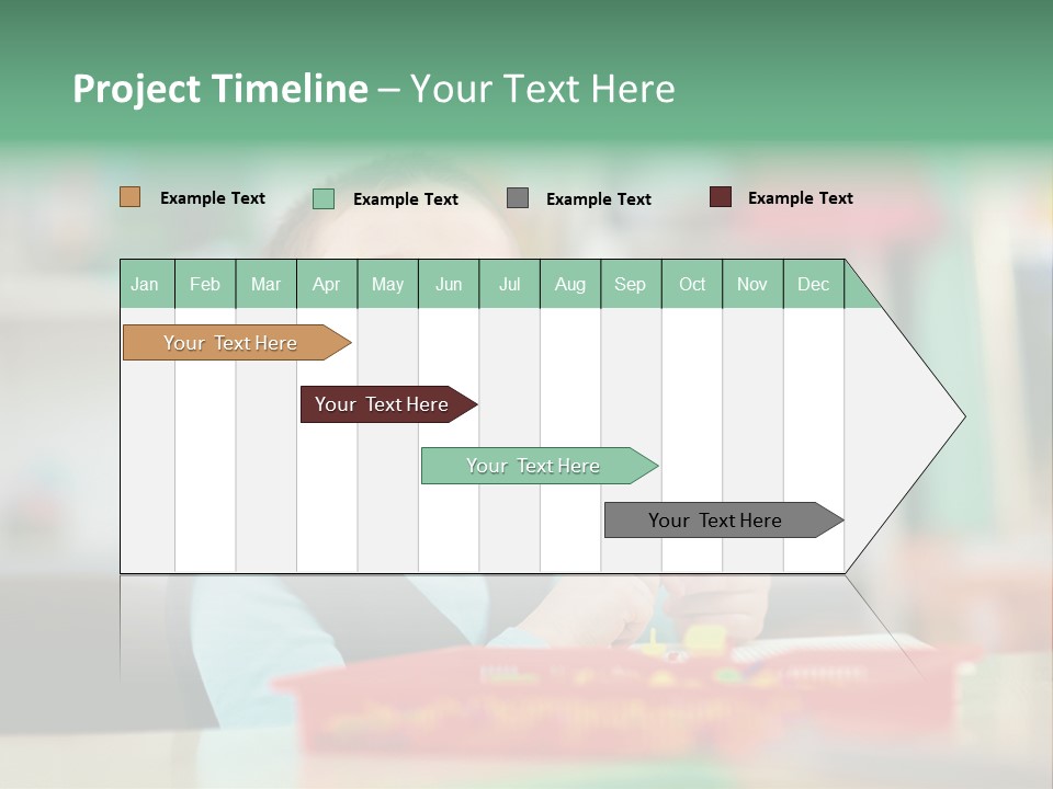 A Young Boy Is Sitting At A Table PowerPoint Template