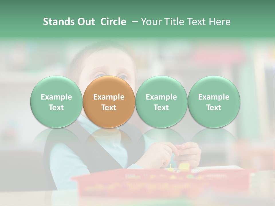 A Young Boy Is Sitting At A Table PowerPoint Template