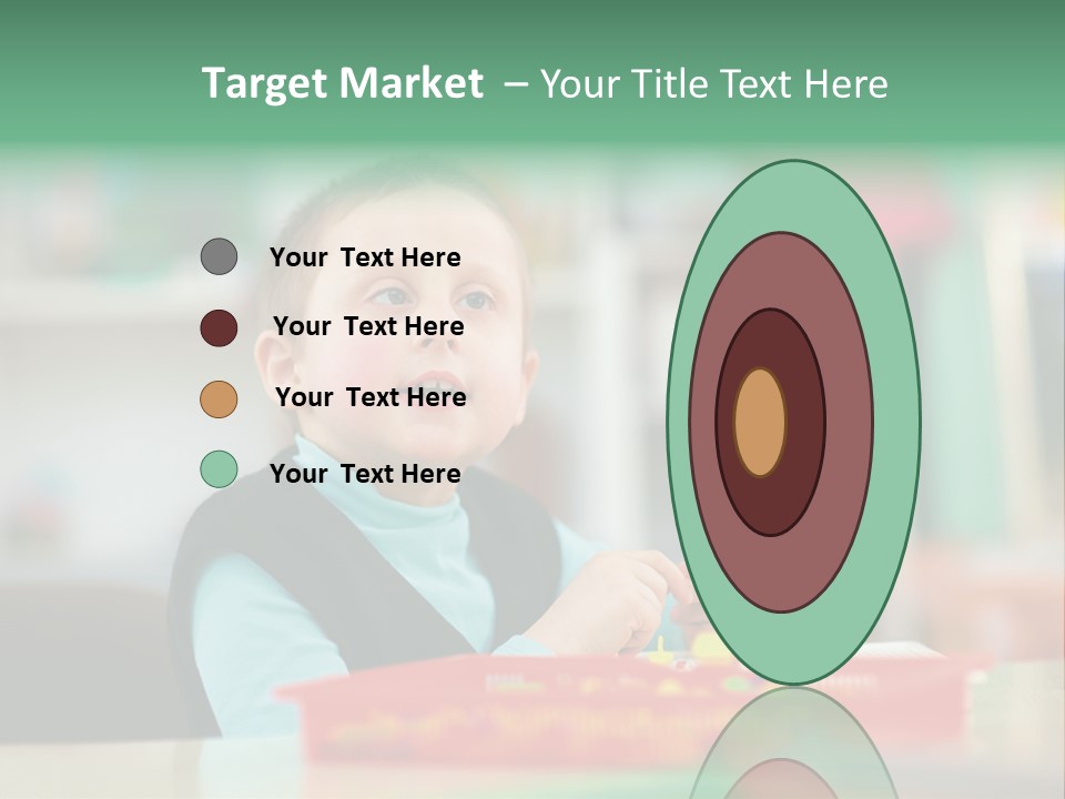 A Young Boy Is Sitting At A Table PowerPoint Template