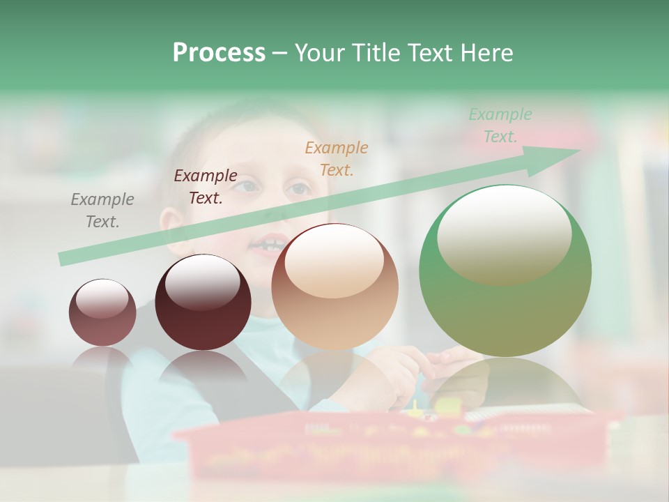 A Young Boy Is Sitting At A Table PowerPoint Template