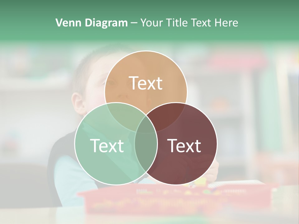 A Young Boy Is Sitting At A Table PowerPoint Template