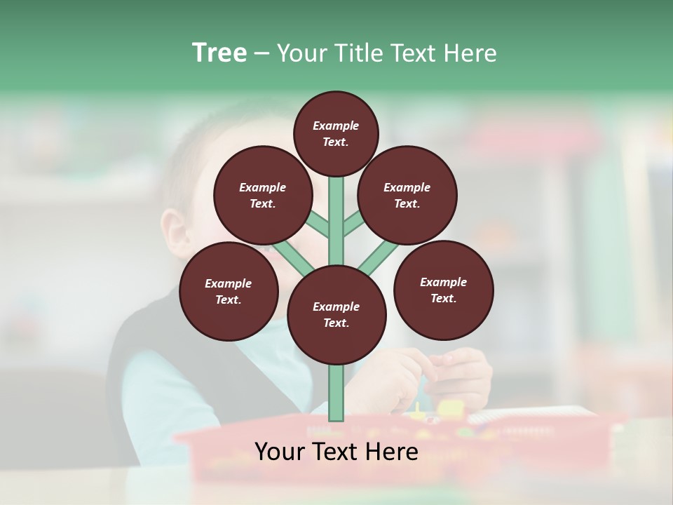 A Young Boy Is Sitting At A Table PowerPoint Template