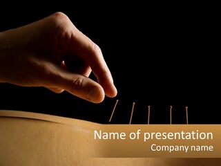 A Person's Hand Is Holding A Pin On Top Of A Piece Of Wood PowerPoint Template