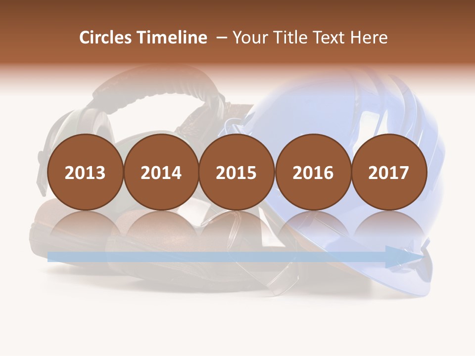 A Blue Hard Hat And Ear Muffs On Top Of A Pair Of Shoes PowerPoint Template