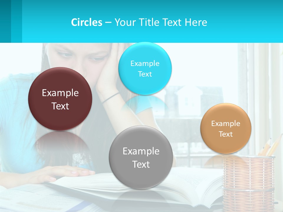 A Girl Sitting At A Desk With A Book And Pen PowerPoint Template