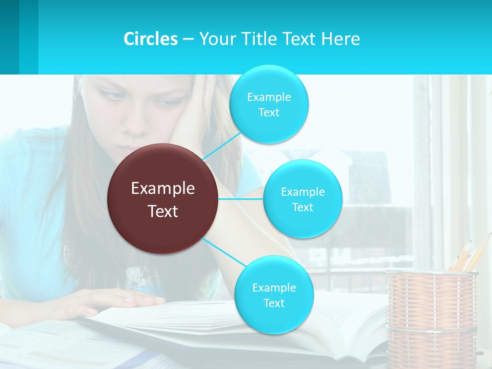 A Girl Sitting At A Desk With A Book And Pen PowerPoint Template