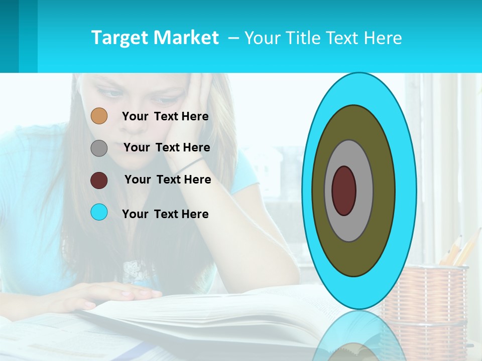 A Girl Sitting At A Desk With A Book And Pen PowerPoint Template