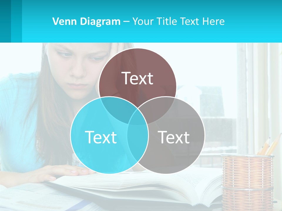 A Girl Sitting At A Desk With A Book And Pen PowerPoint Template