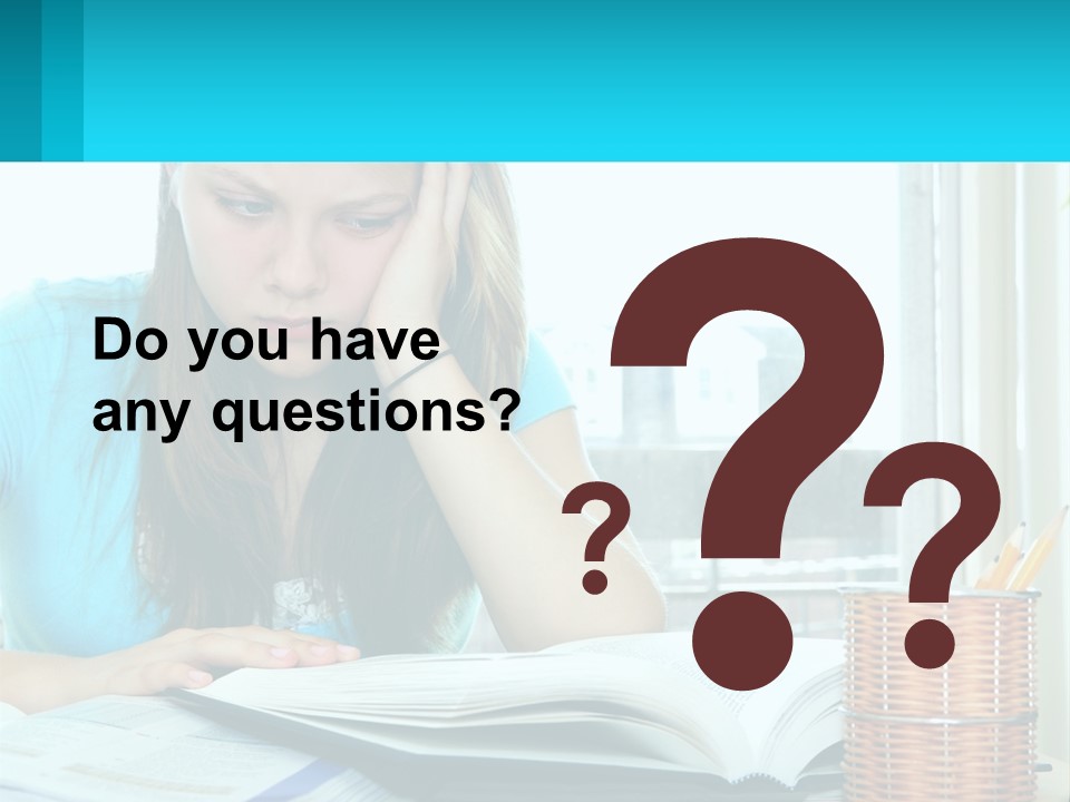 A Girl Sitting At A Desk With A Book And Pen PowerPoint Template