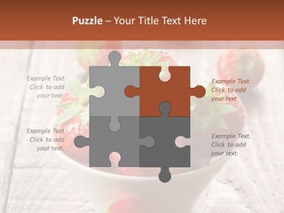 A Bowl Of Strawberries On A Wooden Table PowerPoint Template