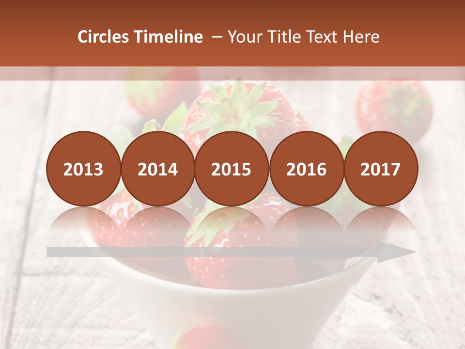 A Bowl Of Strawberries On A Wooden Table PowerPoint Template