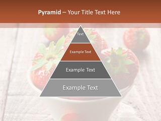 A Bowl Of Strawberries On A Wooden Table PowerPoint Template