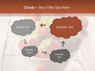 A Bowl Of Strawberries On A Wooden Table PowerPoint Template