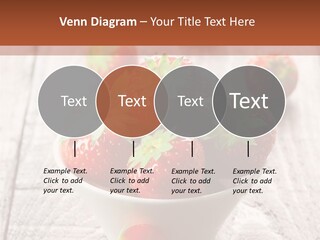 A Bowl Of Strawberries On A Wooden Table PowerPoint Template