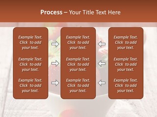 A Bowl Of Strawberries On A Wooden Table PowerPoint Template