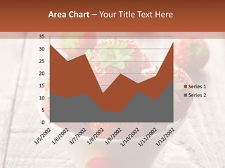 A Bowl Of Strawberries On A Wooden Table PowerPoint Template