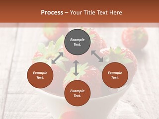 A Bowl Of Strawberries On A Wooden Table PowerPoint Template