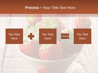 A Bowl Of Strawberries On A Wooden Table PowerPoint Template