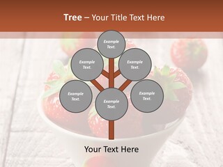 A Bowl Of Strawberries On A Wooden Table PowerPoint Template