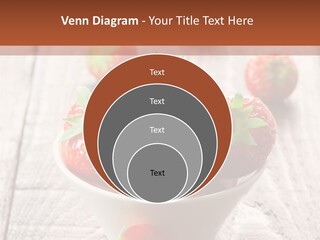 A Bowl Of Strawberries On A Wooden Table PowerPoint Template