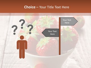 A Bowl Of Strawberries On A Wooden Table PowerPoint Template