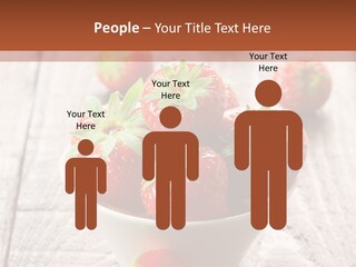 A Bowl Of Strawberries On A Wooden Table PowerPoint Template