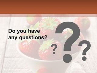 A Bowl Of Strawberries On A Wooden Table PowerPoint Template