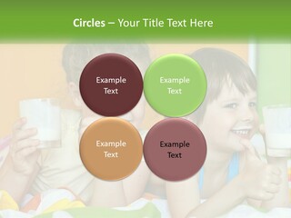 Two Little Girls Sitting On A Bed With A Glass Of Milk PowerPoint Template