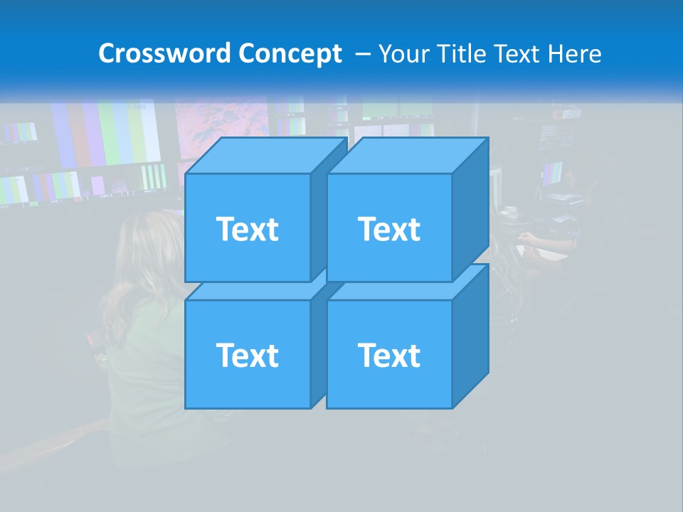 A Group Of People Sitting At A Desk With Computers PowerPoint Template