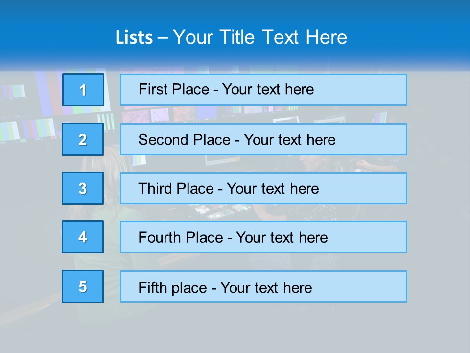 A Group Of People Sitting At A Desk With Computers PowerPoint Template