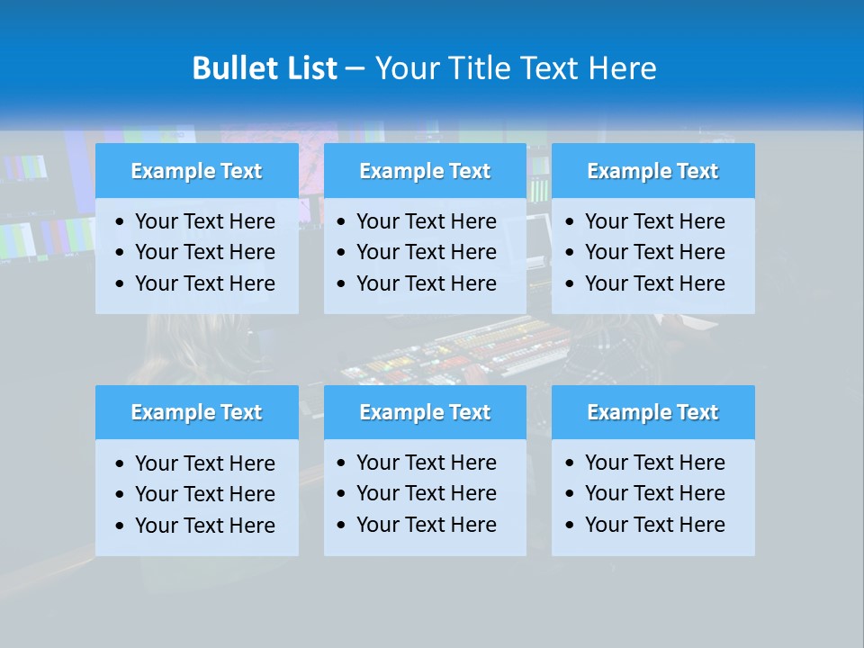 A Group Of People Sitting At A Desk With Computers PowerPoint Template