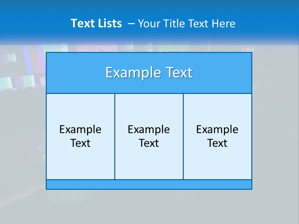 A Group Of People Sitting At A Desk With Computers PowerPoint Template