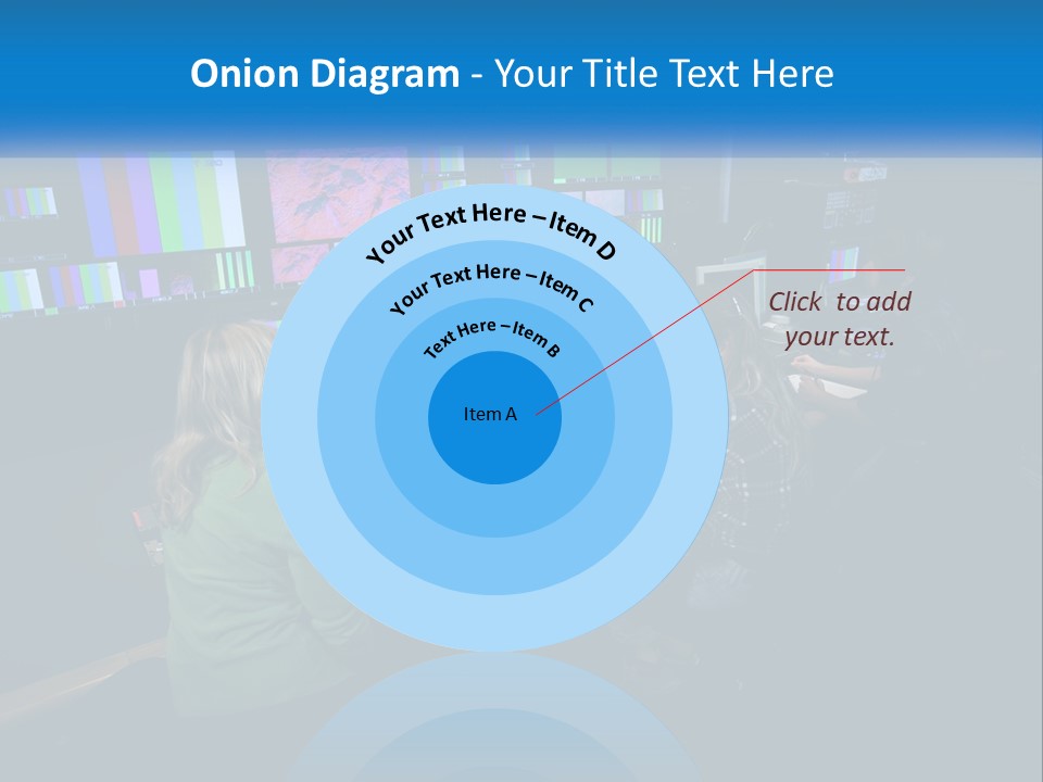 A Group Of People Sitting At A Desk With Computers PowerPoint Template