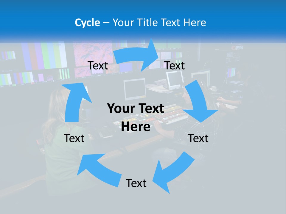 A Group Of People Sitting At A Desk With Computers PowerPoint Template