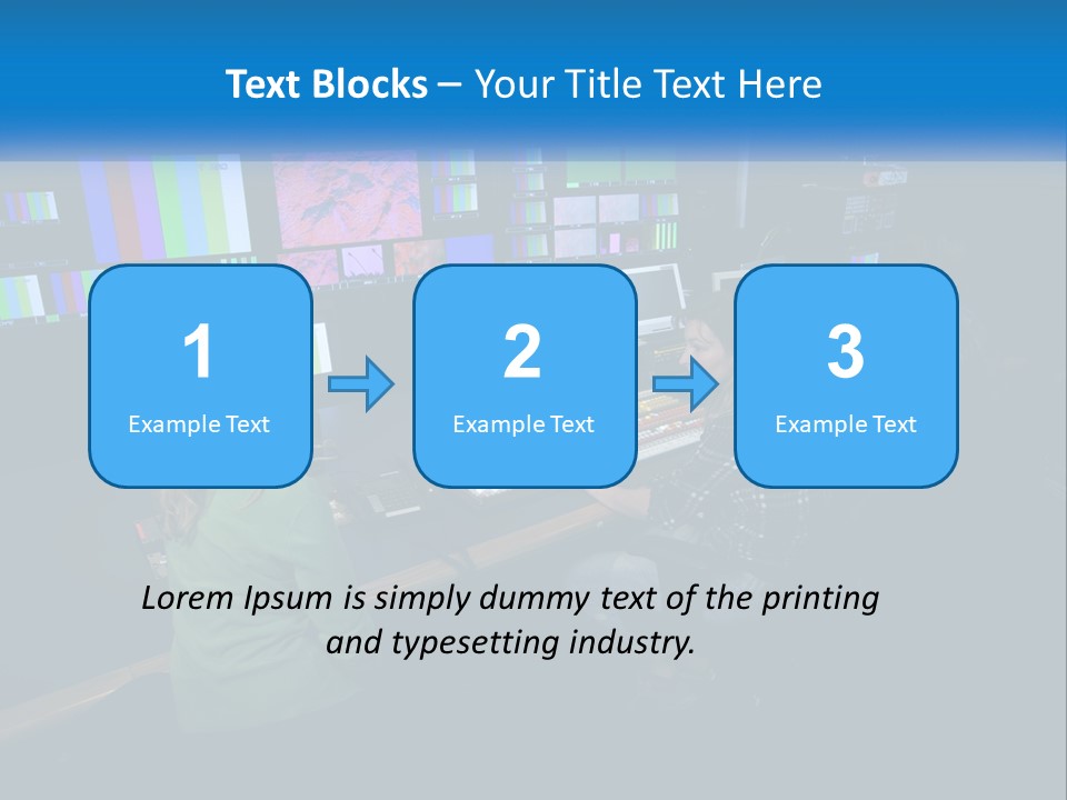 A Group Of People Sitting At A Desk With Computers PowerPoint Template
