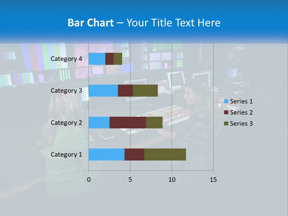 A Group Of People Sitting At A Desk With Computers PowerPoint Template