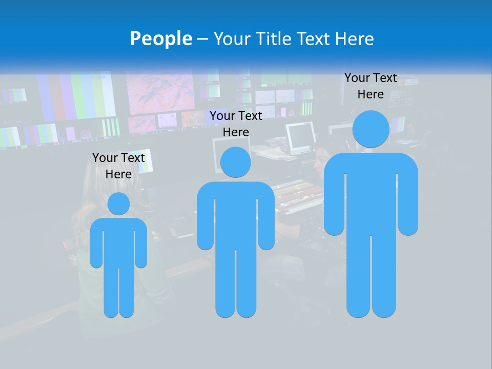 A Group Of People Sitting At A Desk With Computers PowerPoint Template
