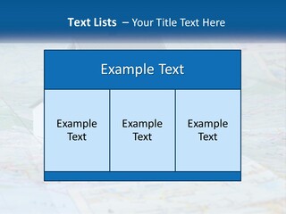 A Small Model House Sitting On Top Of A Map PowerPoint Template