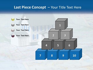 A Small Model House Sitting On Top Of A Map PowerPoint Template