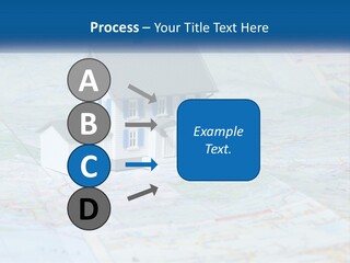 A Small Model House Sitting On Top Of A Map PowerPoint Template