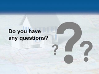A Small Model House Sitting On Top Of A Map PowerPoint Template