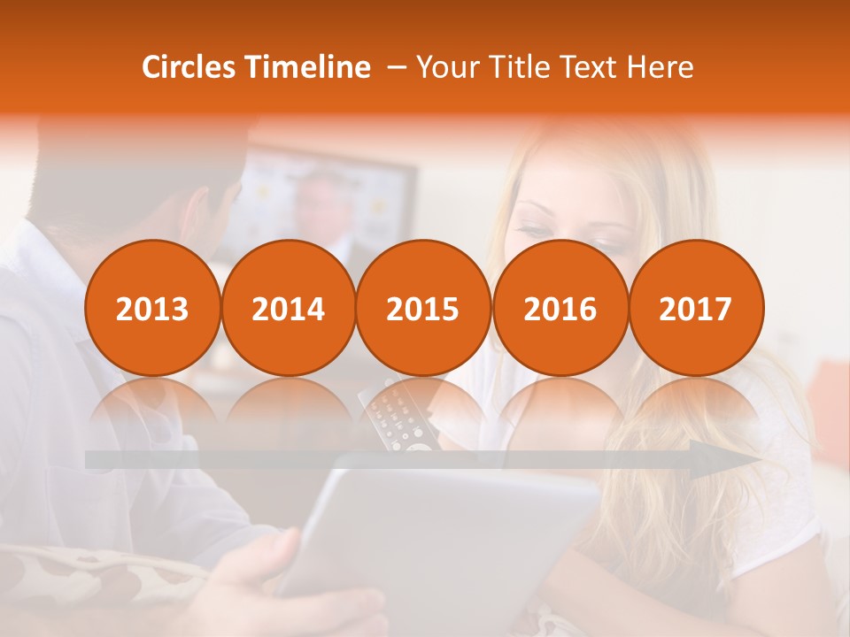 A Man And A Woman Sitting On A Couch Looking At A Remote Control PowerPoint Template