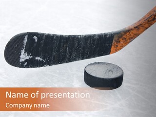 A Hockey Goalie's Hockey Stick And Puck On The Ice PowerPoint Template