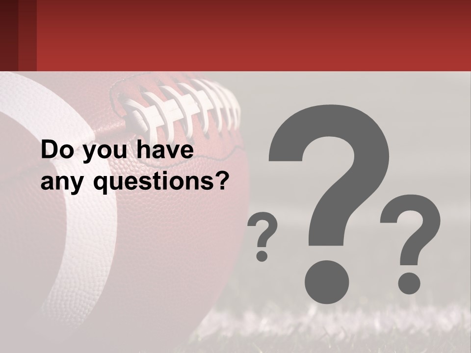 A Football Sitting On Top Of A Field PowerPoint Template