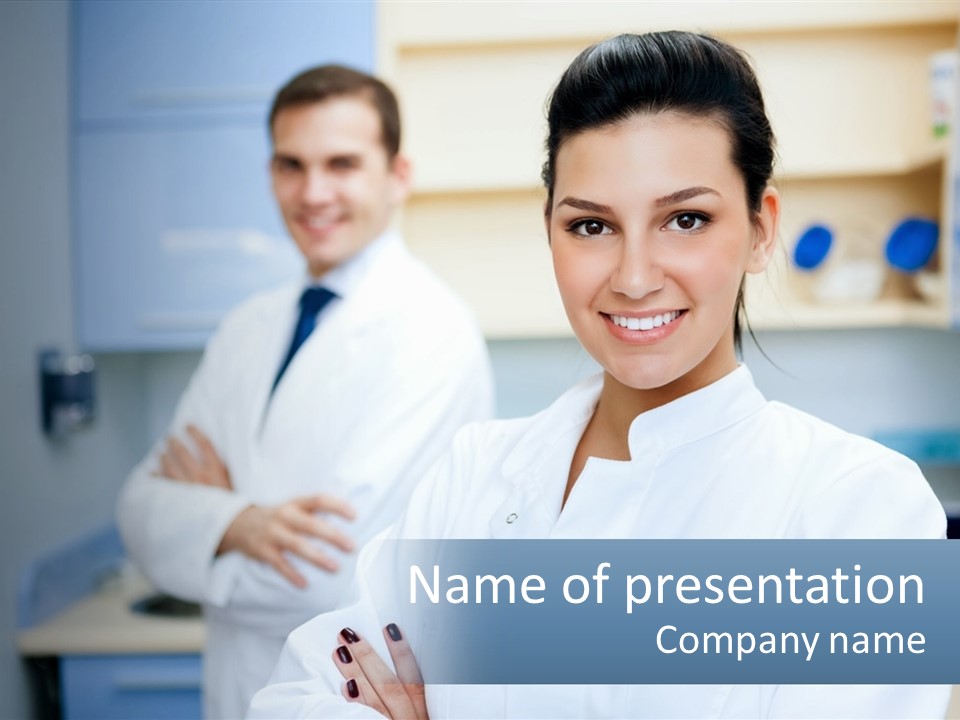 A Woman In A White Lab Coat Standing Next To A Man In A White Lab PowerPoint Template