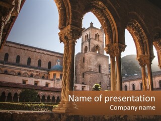 A Large Building With Arches And A Clock Tower PowerPoint Template