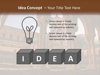 A Large Building With Arches And A Clock Tower PowerPoint Template